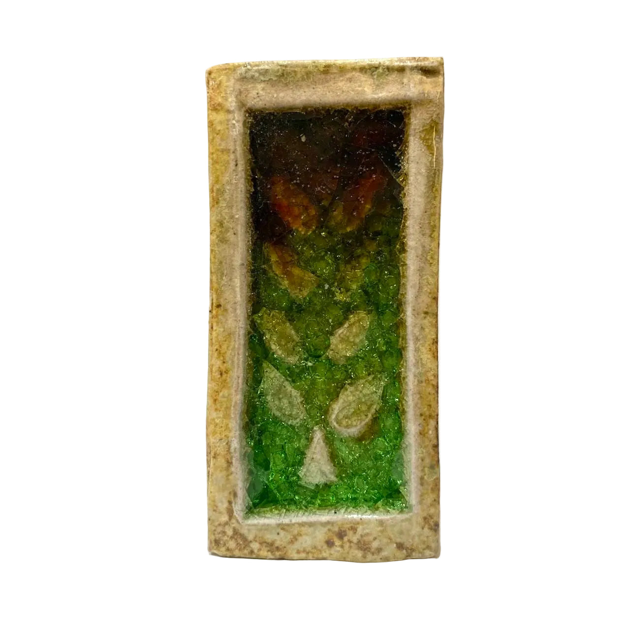 Decorative rectangular object with a green pattern and brown frame on a white background