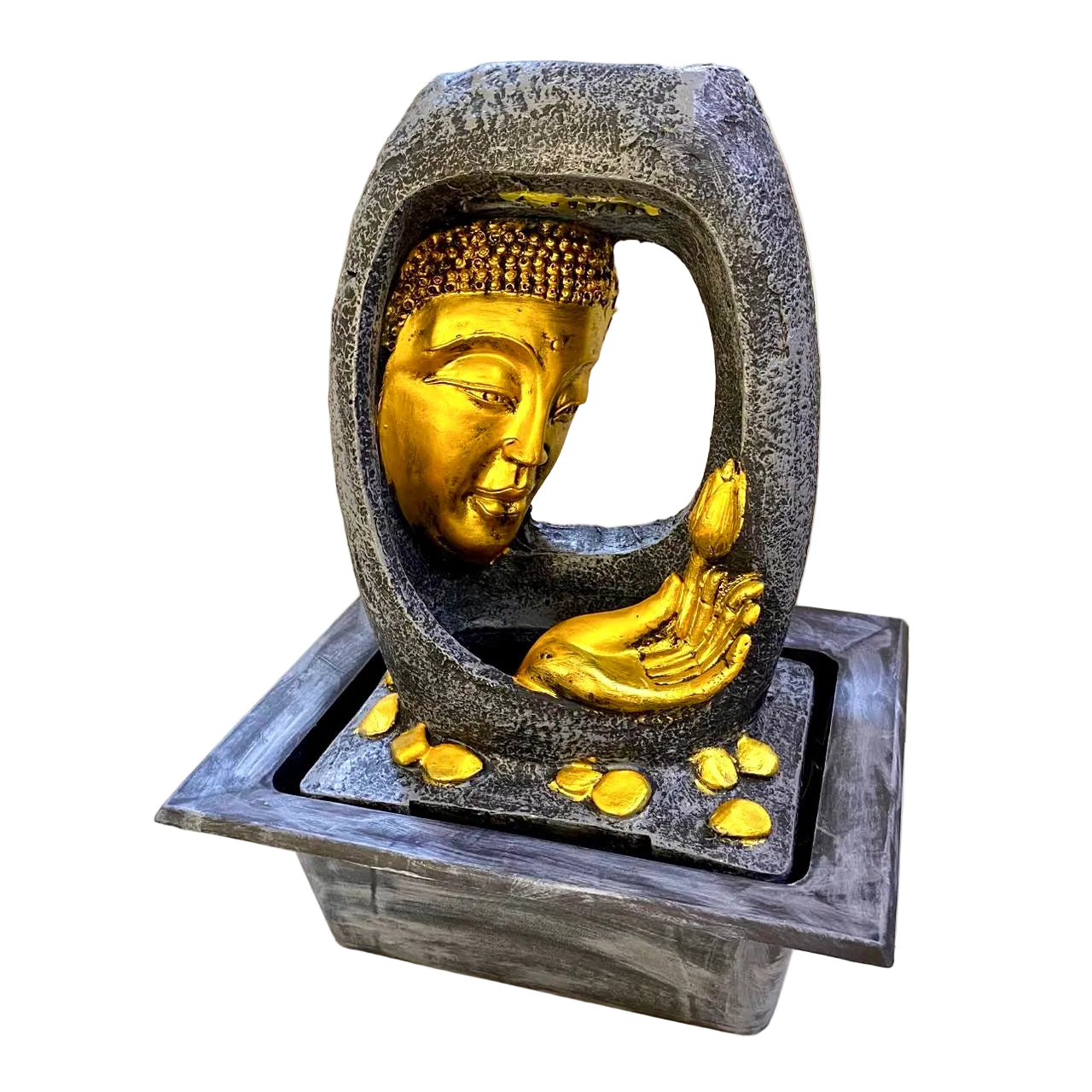 Buddha head sculpture with gold finish on a stone base