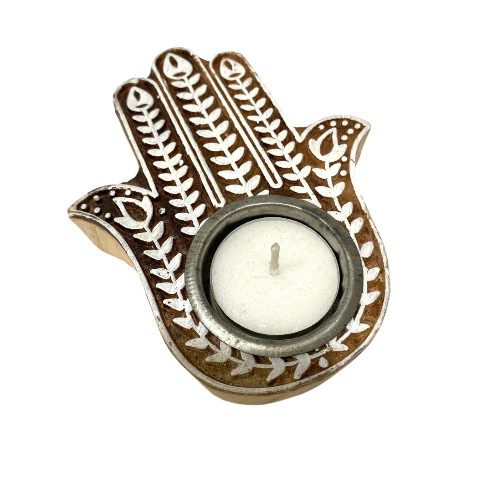 Decorative candle holder shaped like a hand with intricate patterns on a white background
