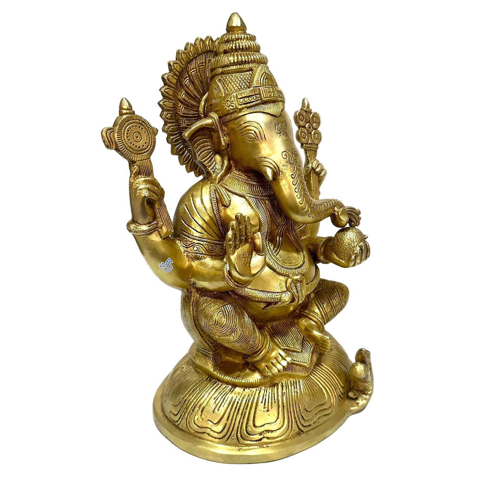 Gold-colored statue of a deity on a white surface