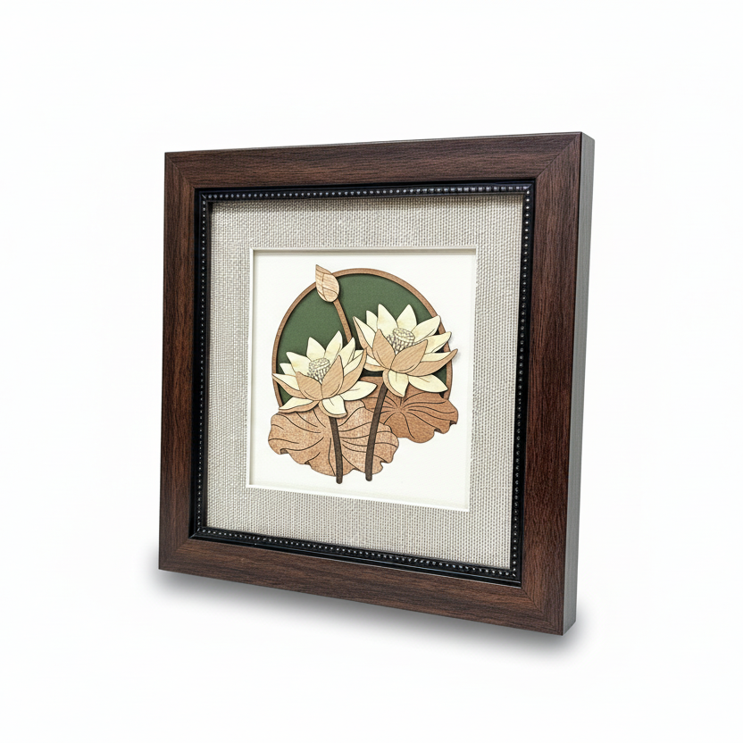 Framed artwork of water lilies on a textured wall.