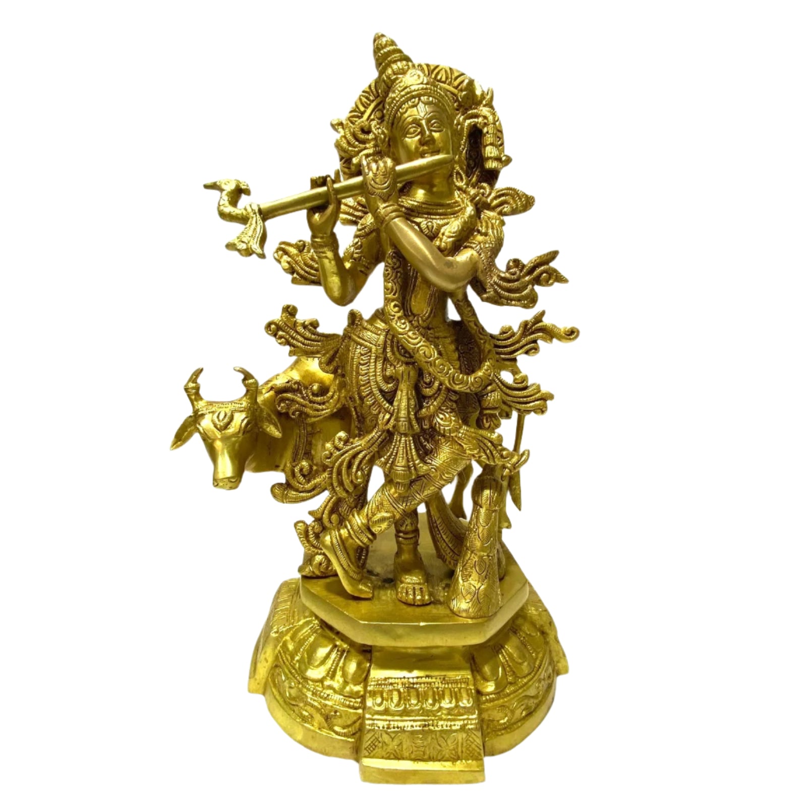 Gold-colored statue of a deity with musical instruments on a white surface