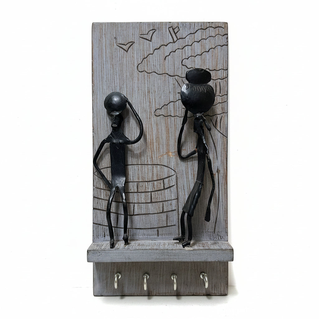 Wooden wall hook with alien design on a white background