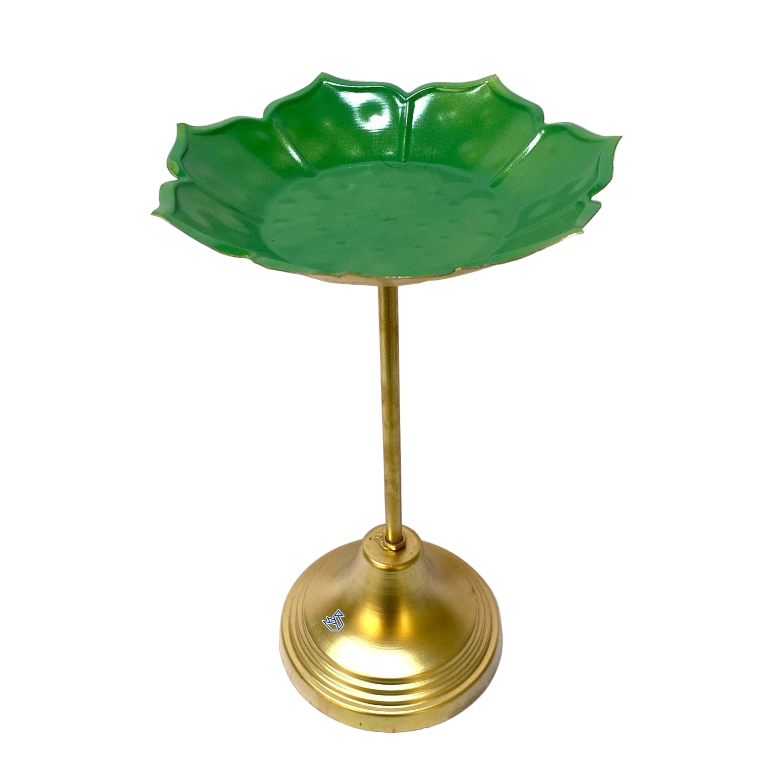 Green dish on a gold stand against a white background