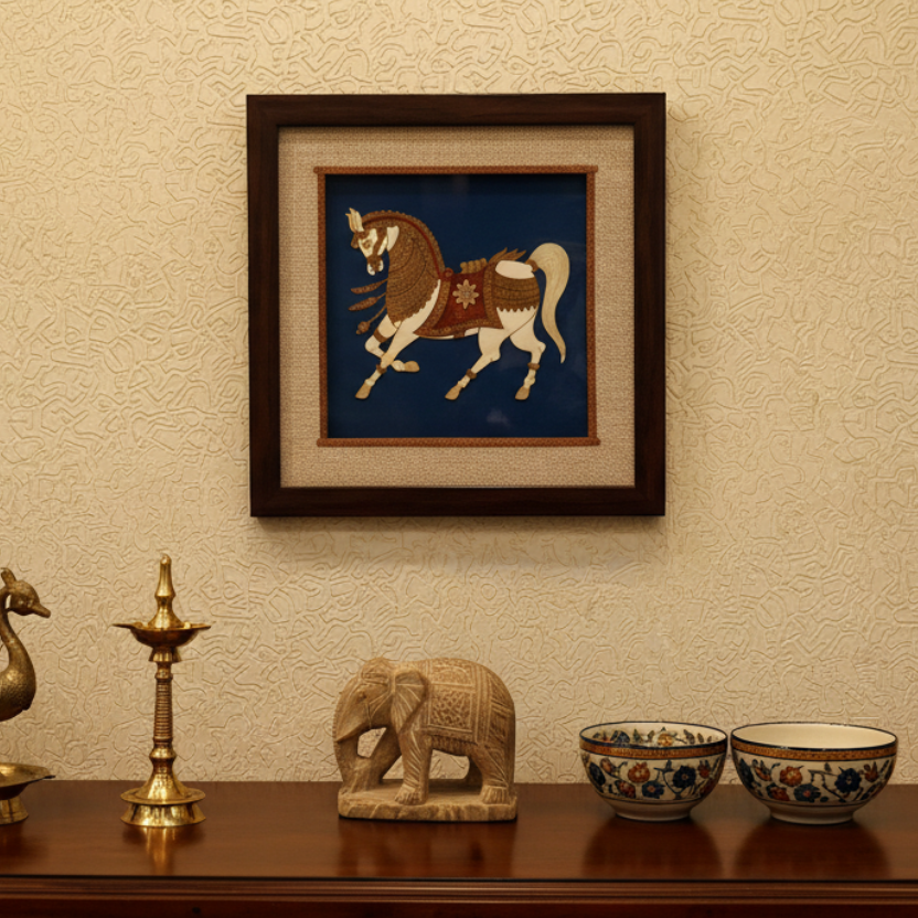 Framed artwork of a horse on a blue background with a textured white wall behind