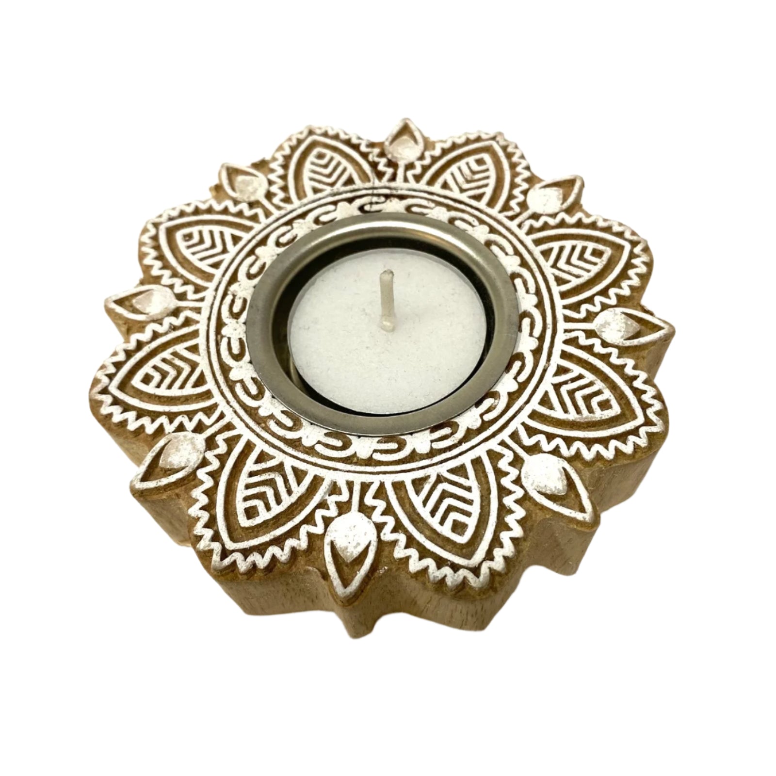 Decorative candle holder with intricate patterns on a white background
