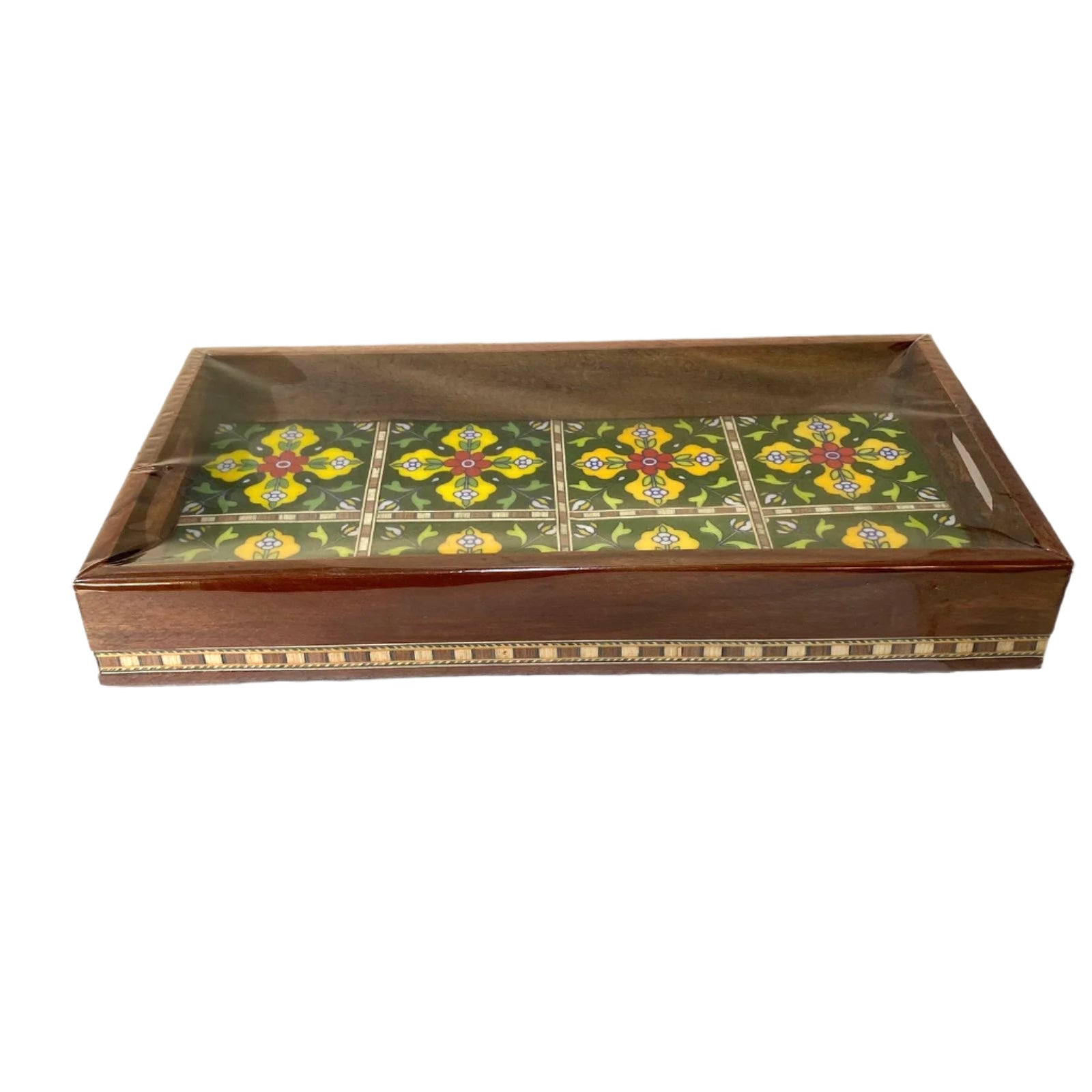 Decorative wooden box with a patterned lid on a white surface