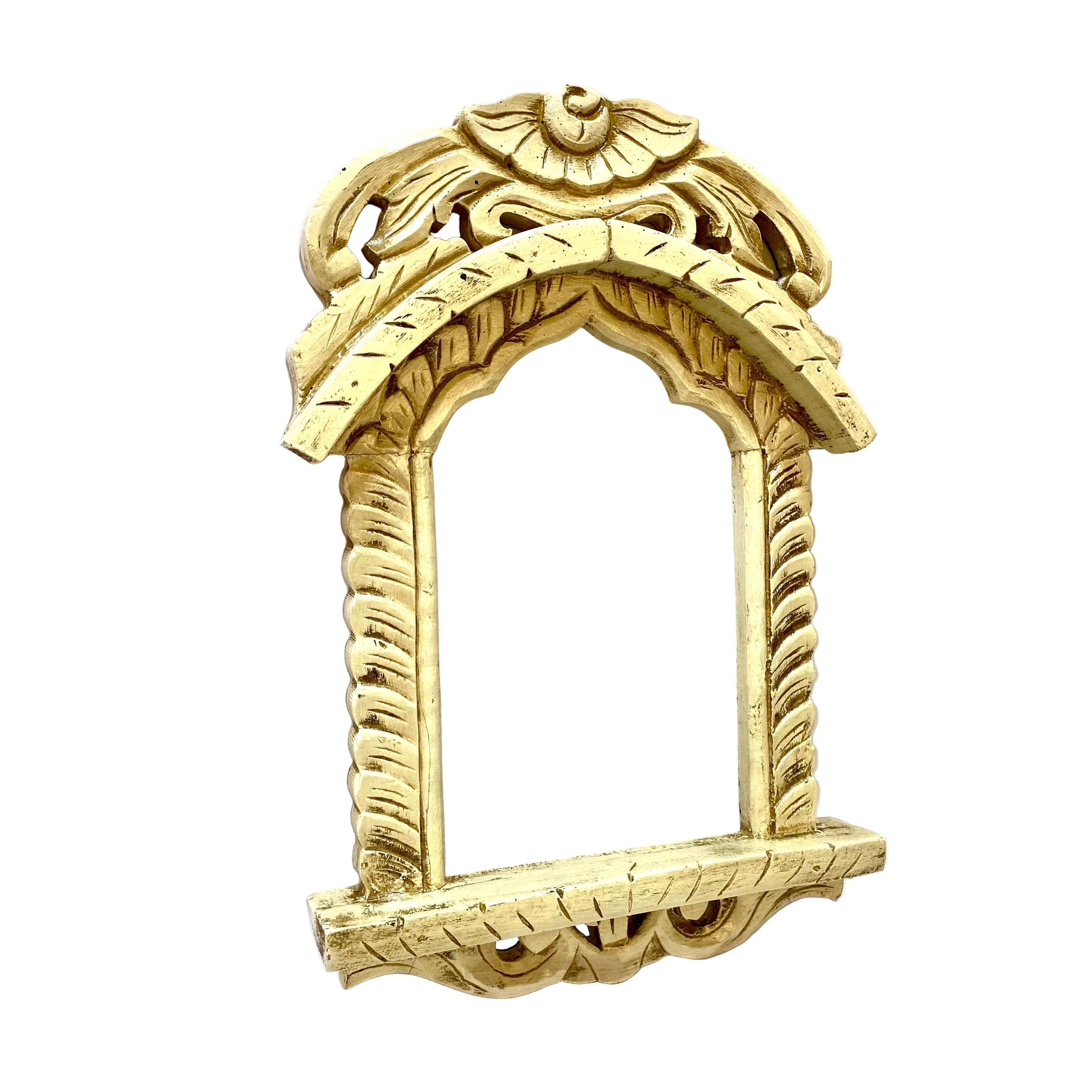 Decorative wall mirror with intricate designs on a white background