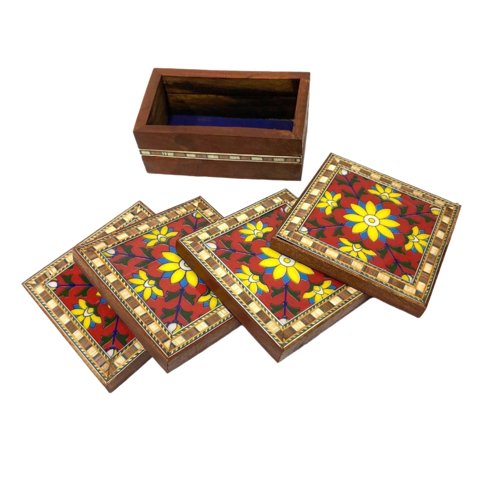 Set of wooden coasters with floral patterns on a white surface