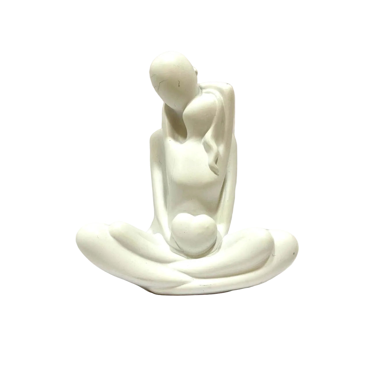 White ceramic sculpture of a seated figure on a plain background