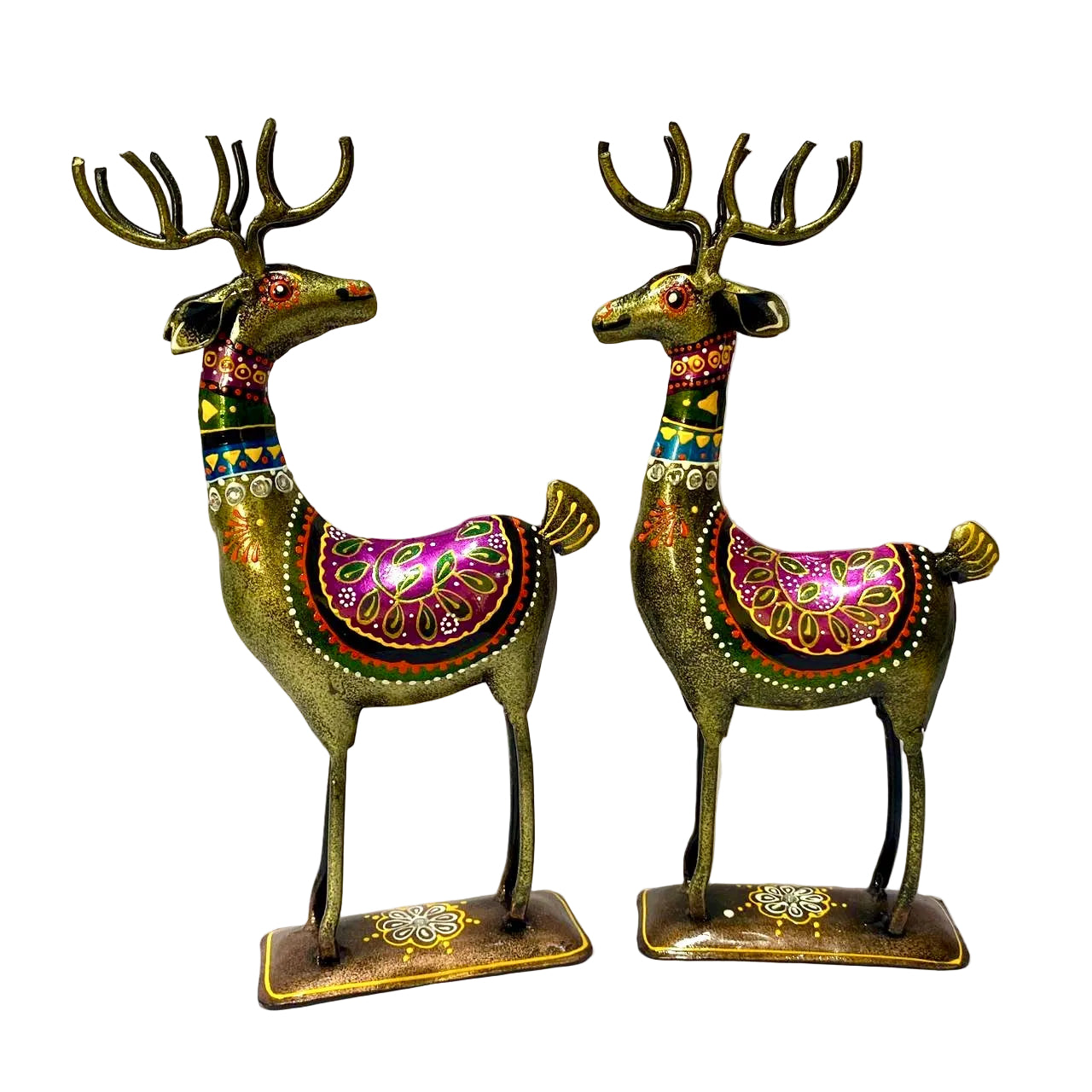 Two ornate deer figurines with colorful patterns on a white background