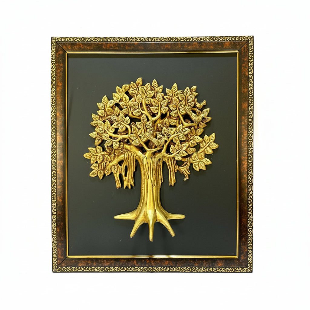 Gold tree sculpture in a decorative frame on a white background