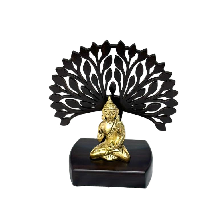 Gold Buddha statue on a black pedestal with a decorative black leaf design on a white background