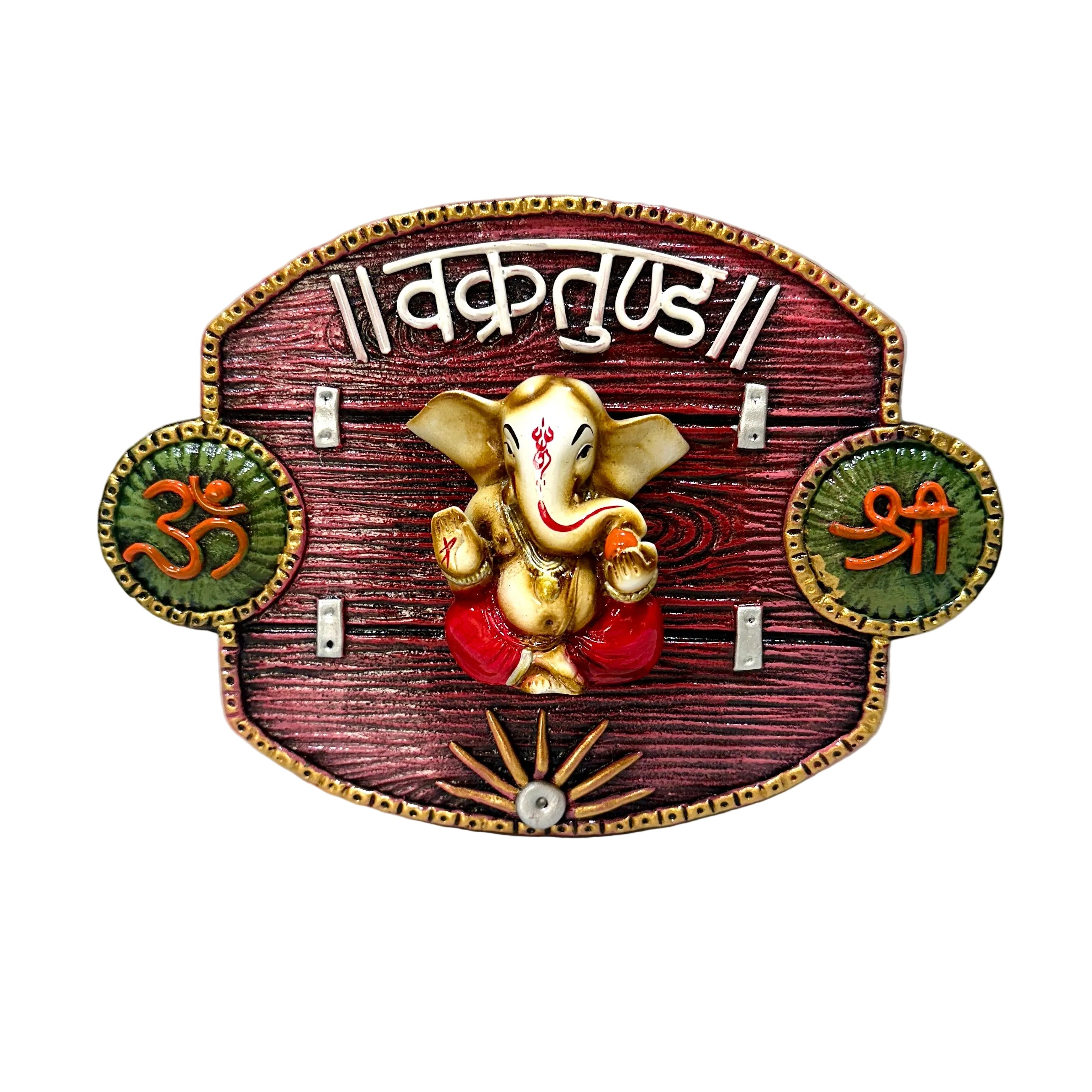 Decorative wall plaque with Ganesha figure and sacred symbols on a white background