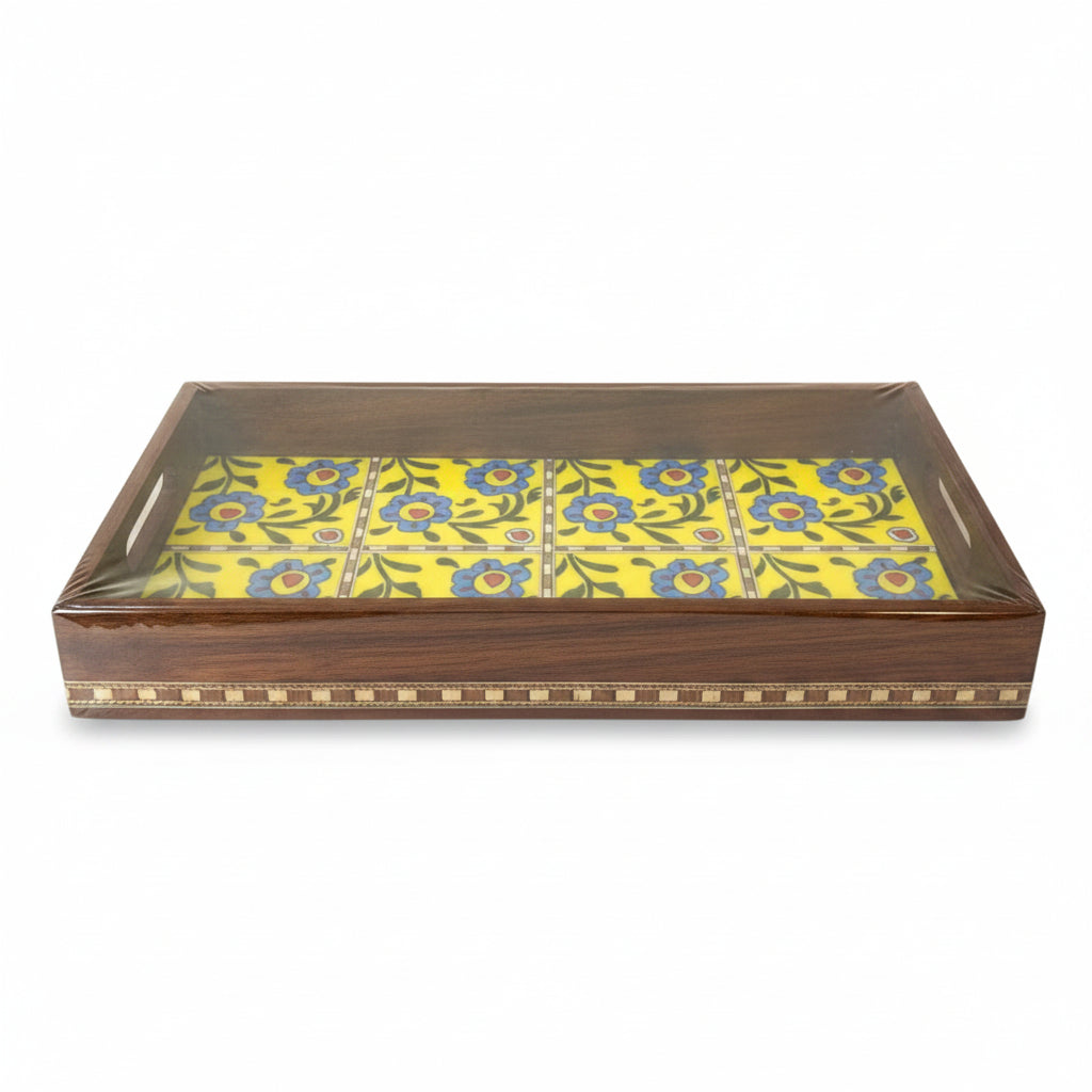 Decorative wooden box with floral pattern on a white surface