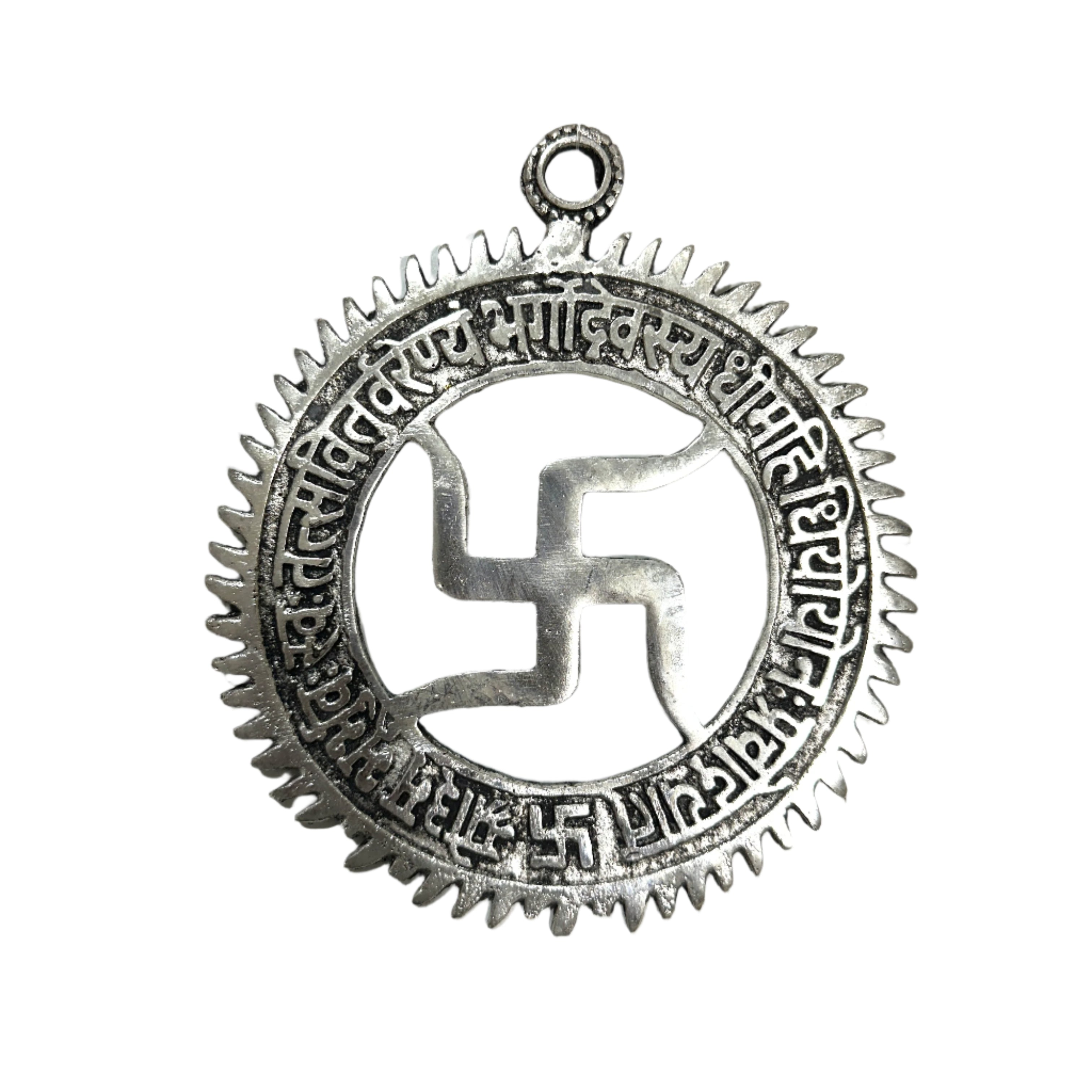 Silver pendant with a swastika design on a light background