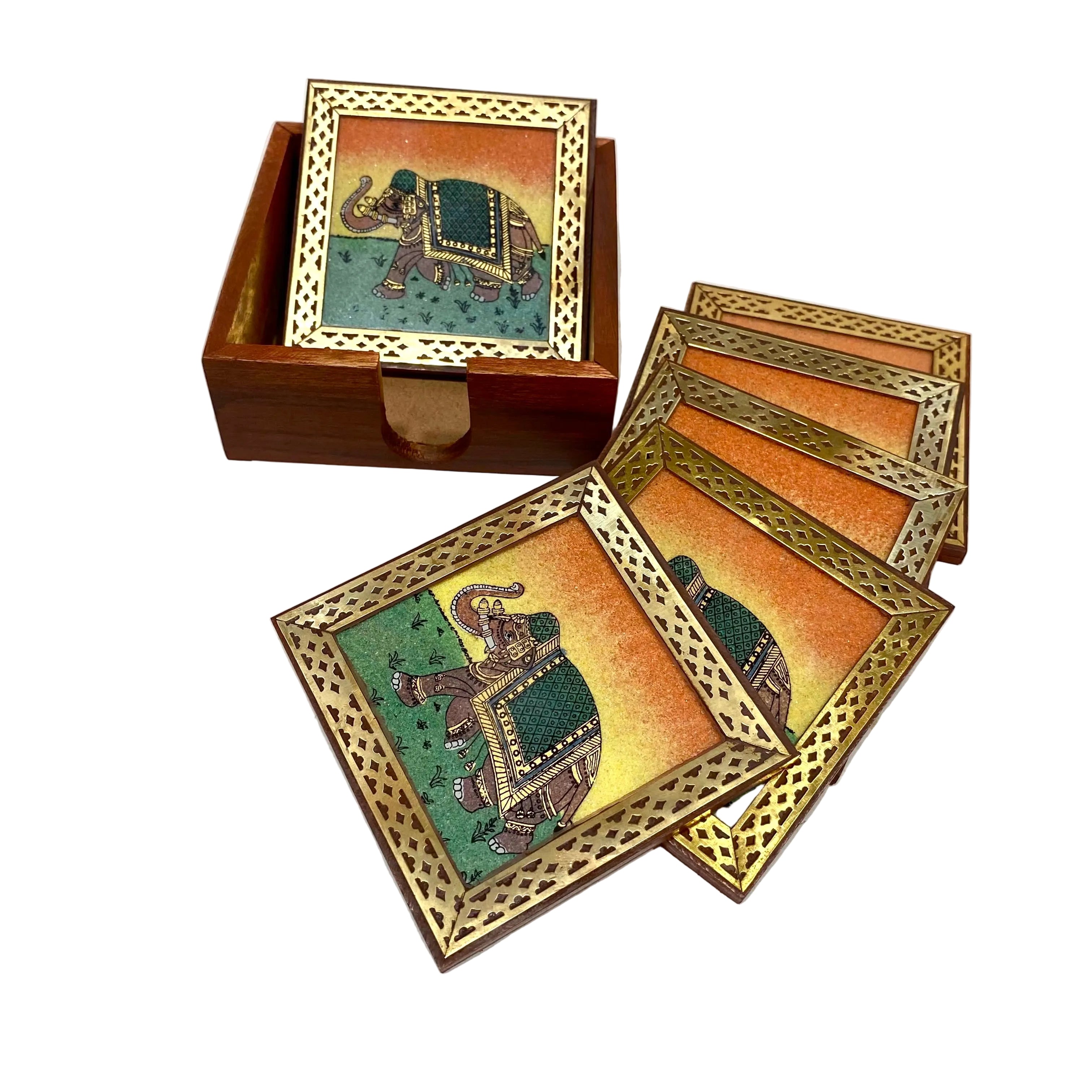 A set of decorative square coasters with matching wooden boxes, featuring a hand-painted elephant design with a gold patterned border on a white surface.