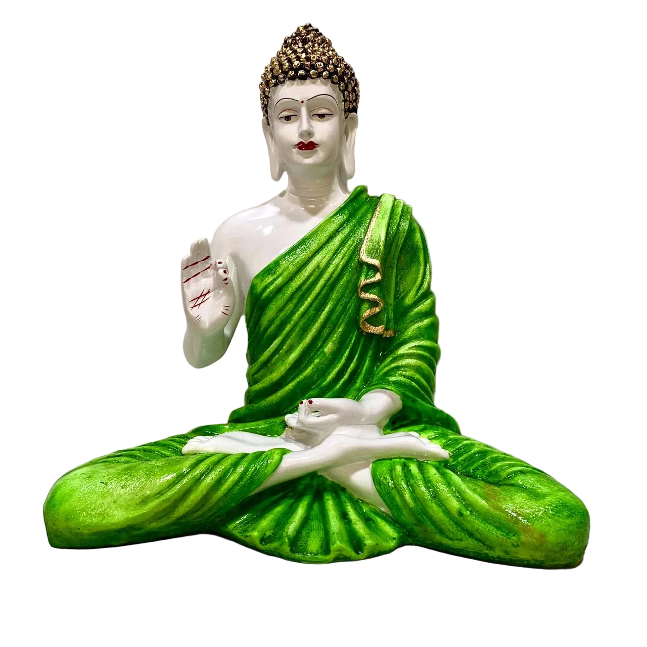 Statue of a seated Buddha figure with green garment on a white background