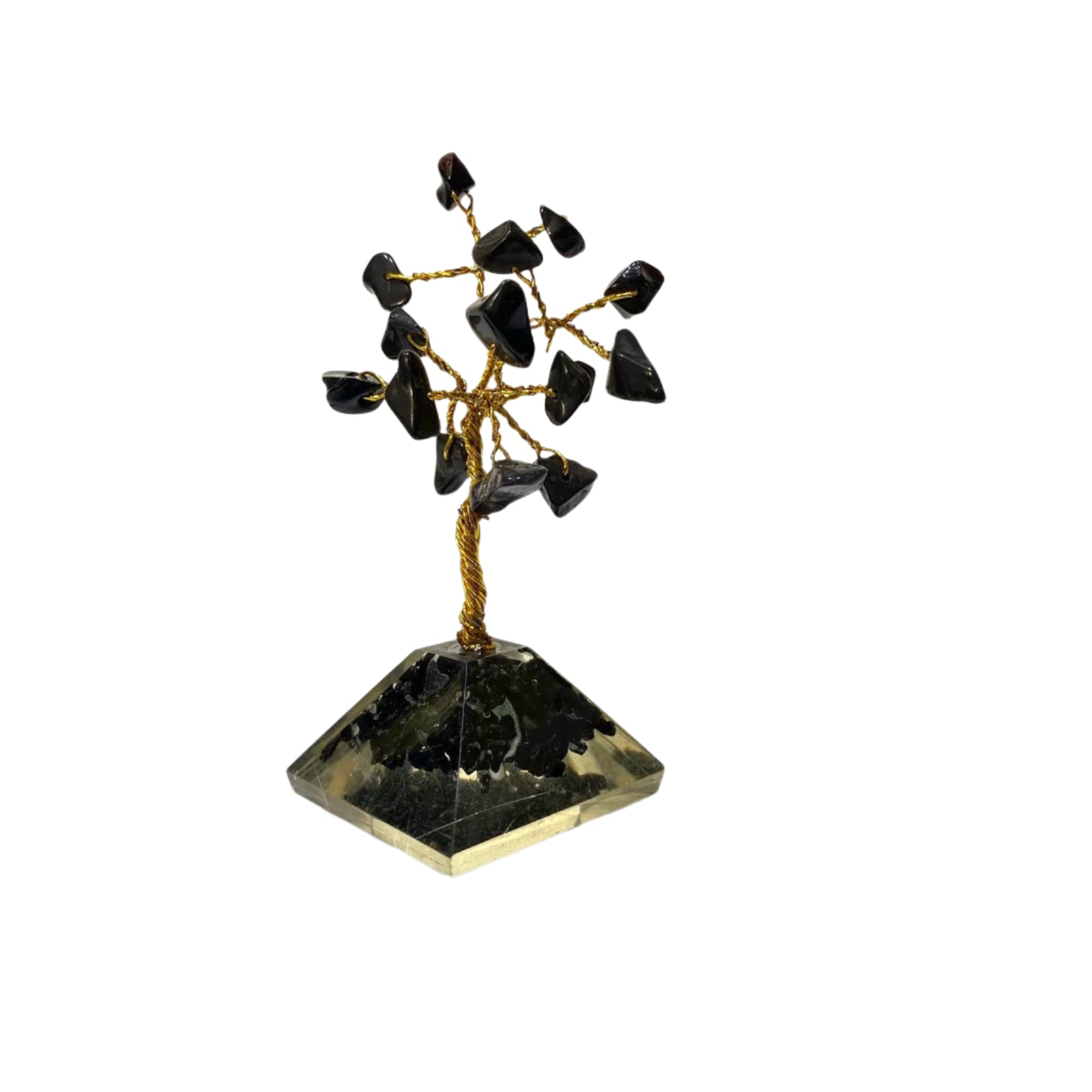 Crystal tree with black stones on a hexagonal crystal base against a white background