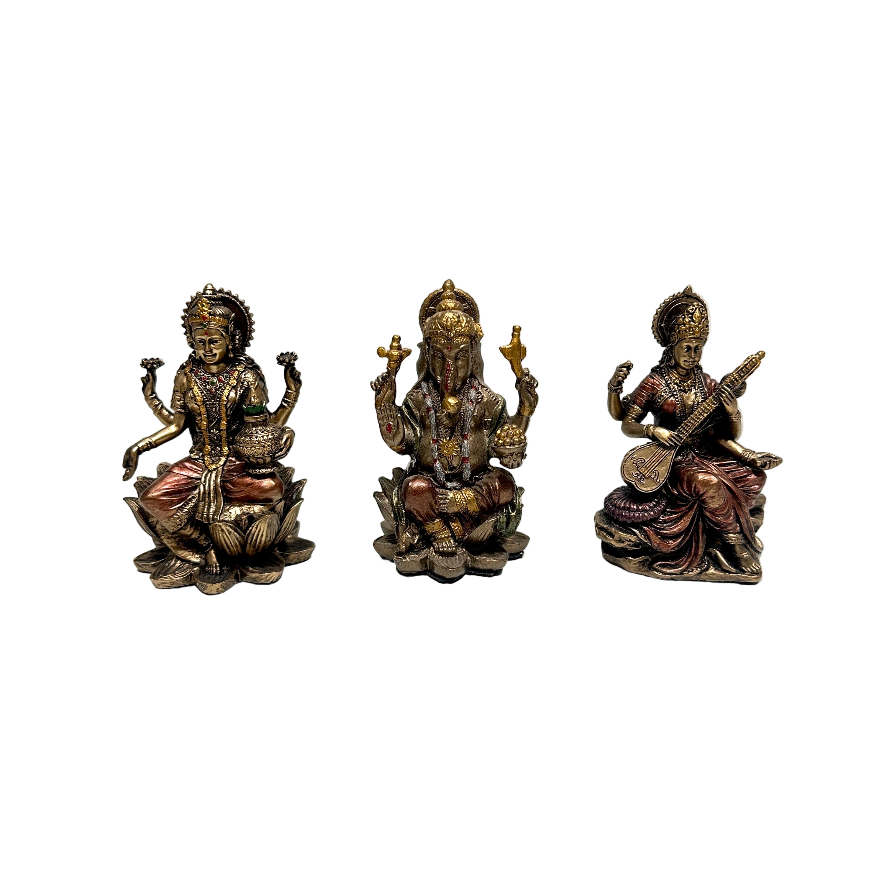 Three bronze statues of deities on a white surface with a light gray background