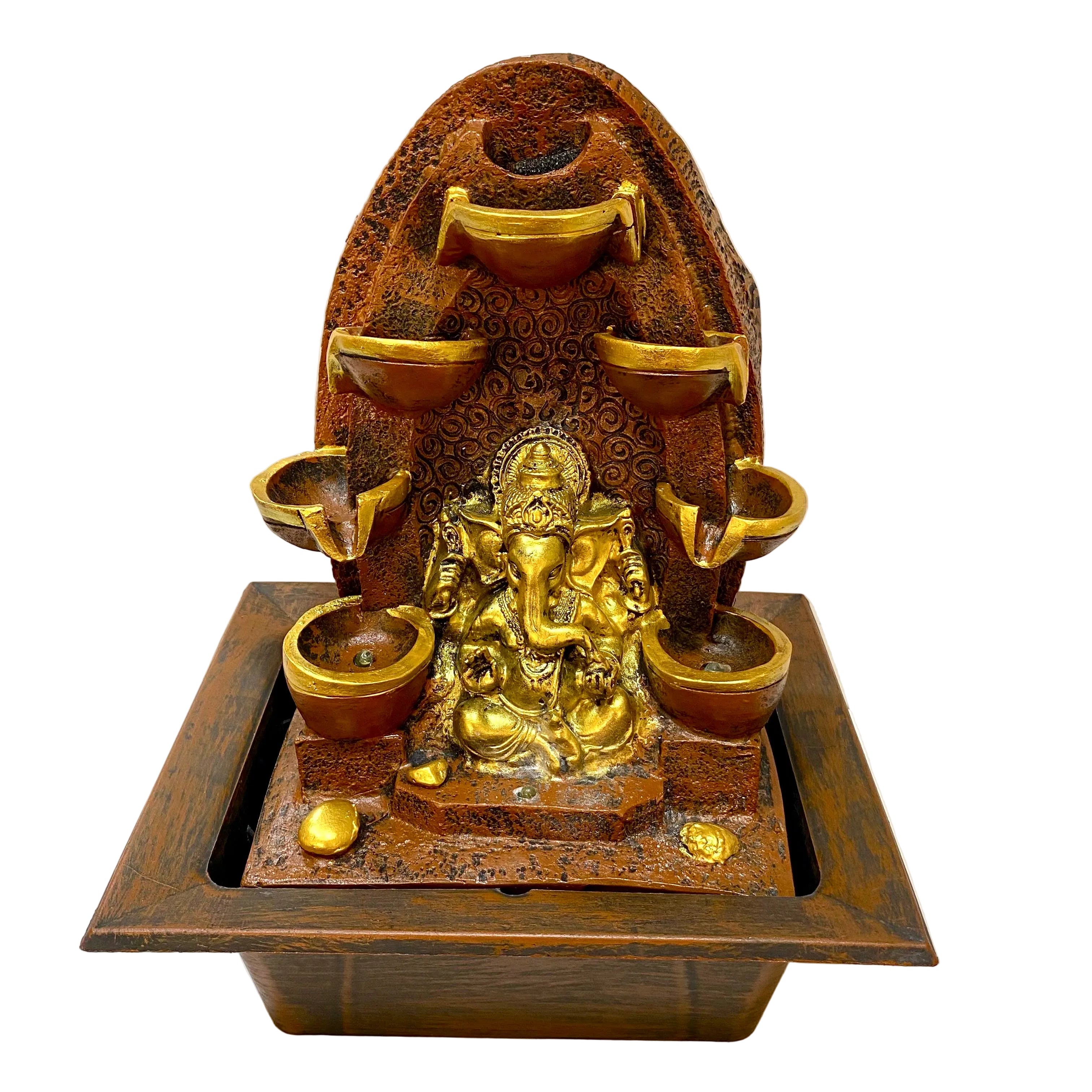 Decorative fountain with a statue of a deity in the center, surrounded by small bowls and containers.