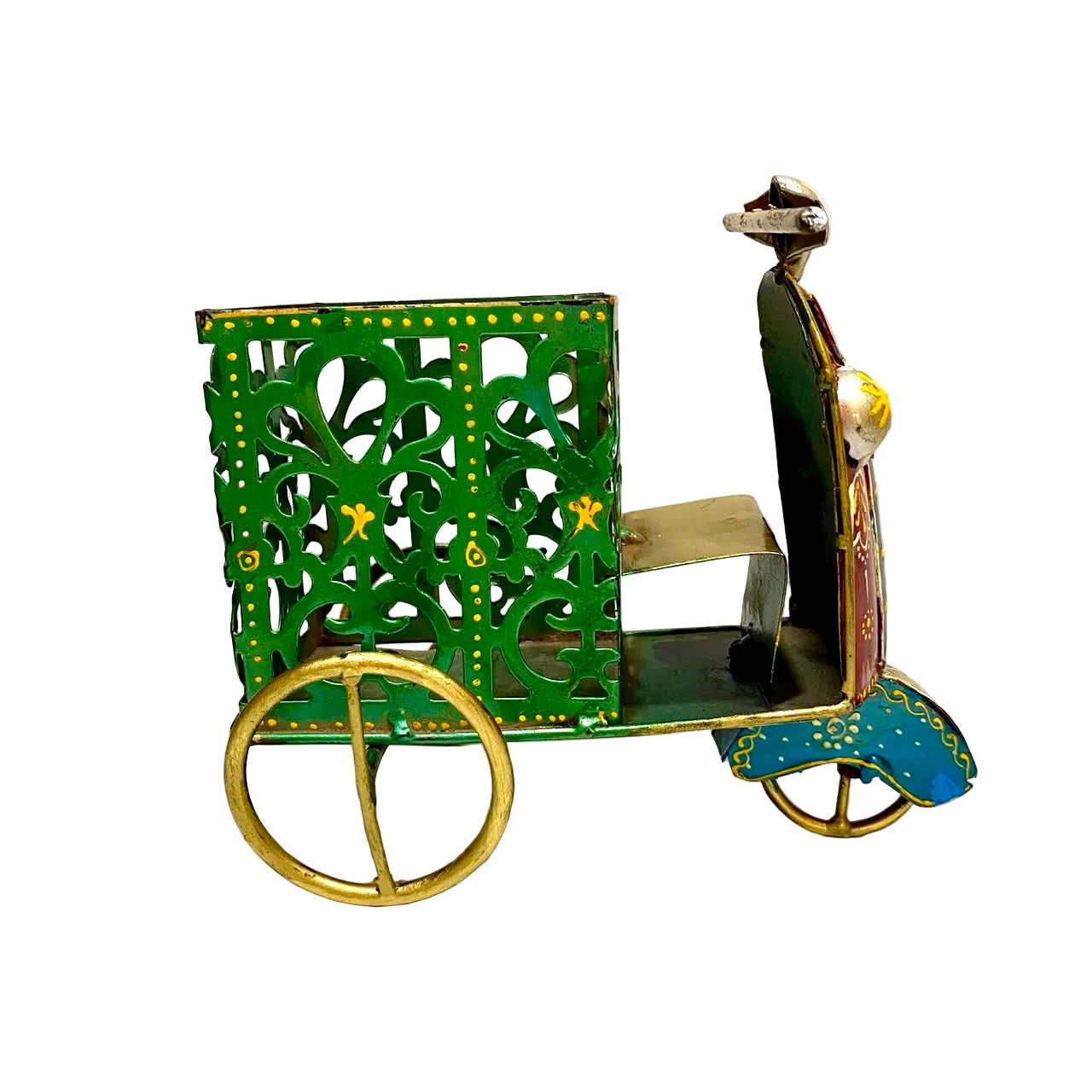 A vintage metal tin toy rickshaw or cart with a green body, gold-toned wheels and trim, and blue detailing on the front wheel, photographed against a plain off-white background.