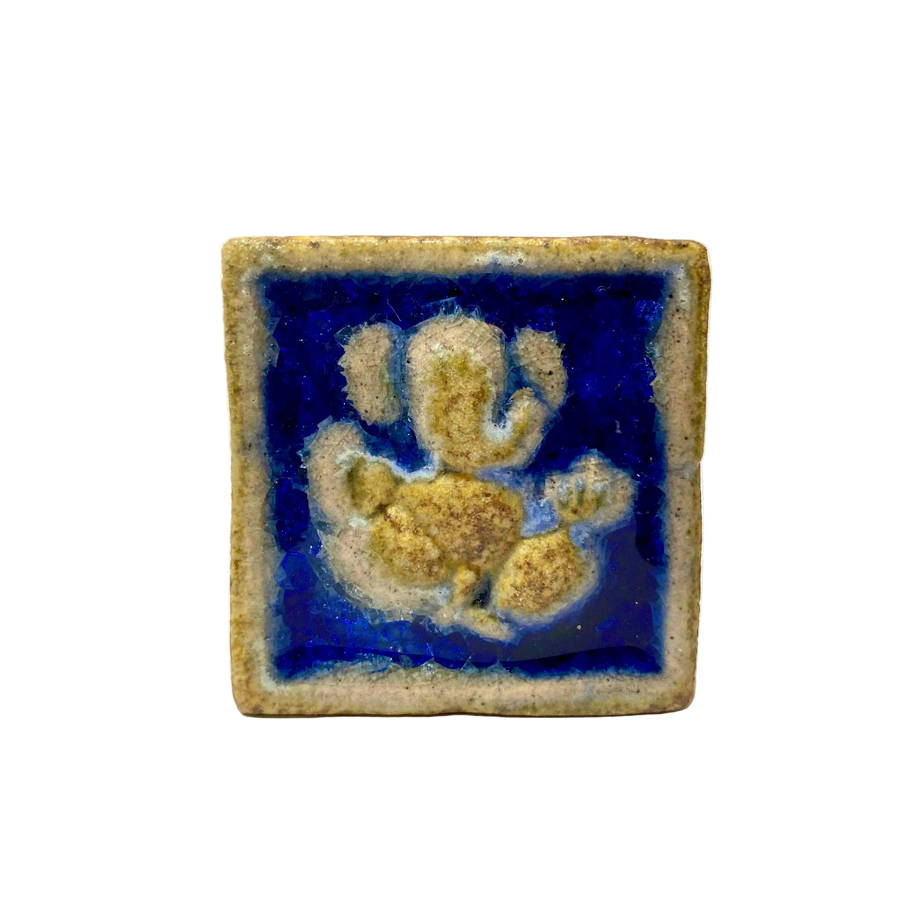 Ceramic tile with a blue background and a white figure on a white background