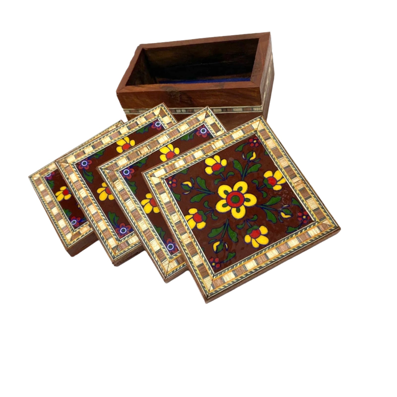 Set of three decorative coasters with floral patterns on a wooden base.