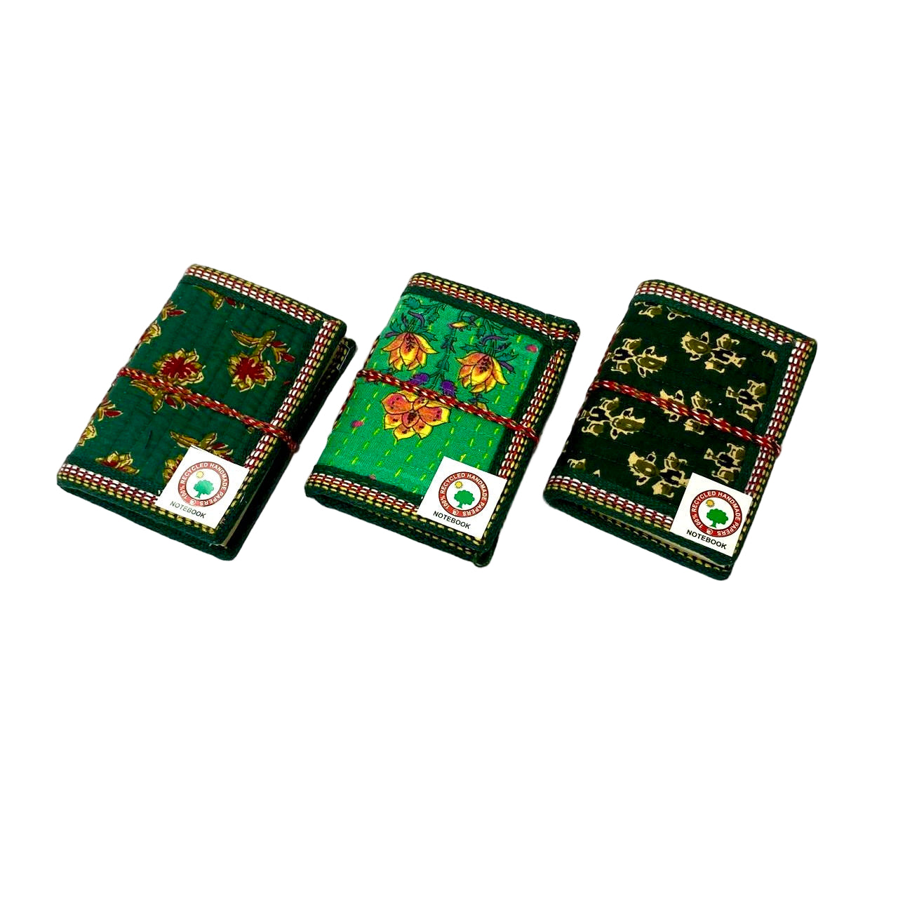 Three green playing card boxes with decorative patterns on a white background