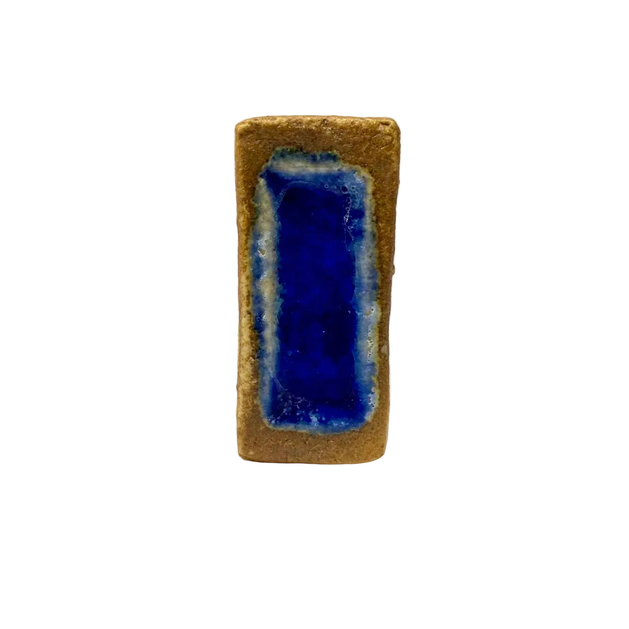 Rectangular stone with a blue interior on a white background