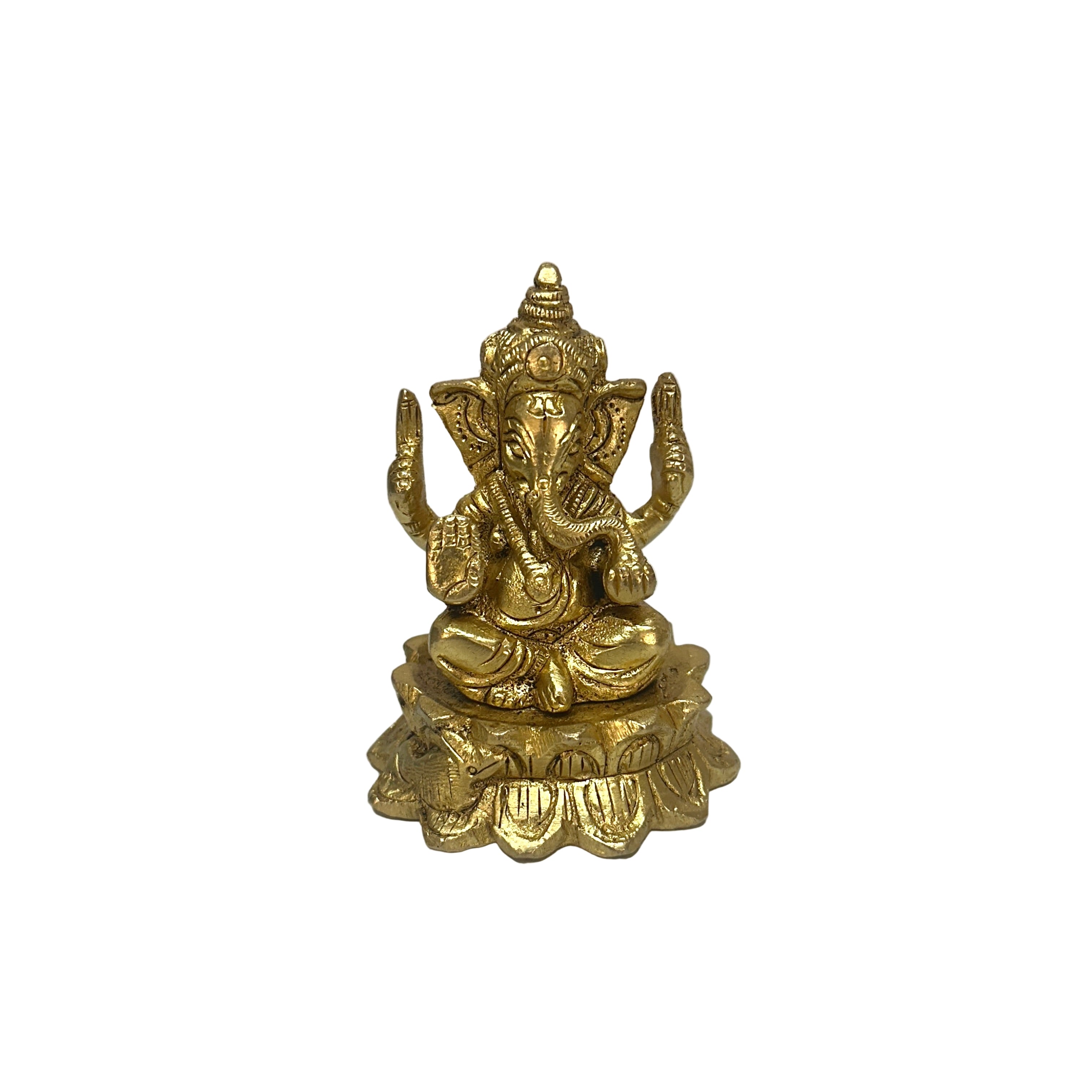 Gold-colored statue of a deity on a white surface