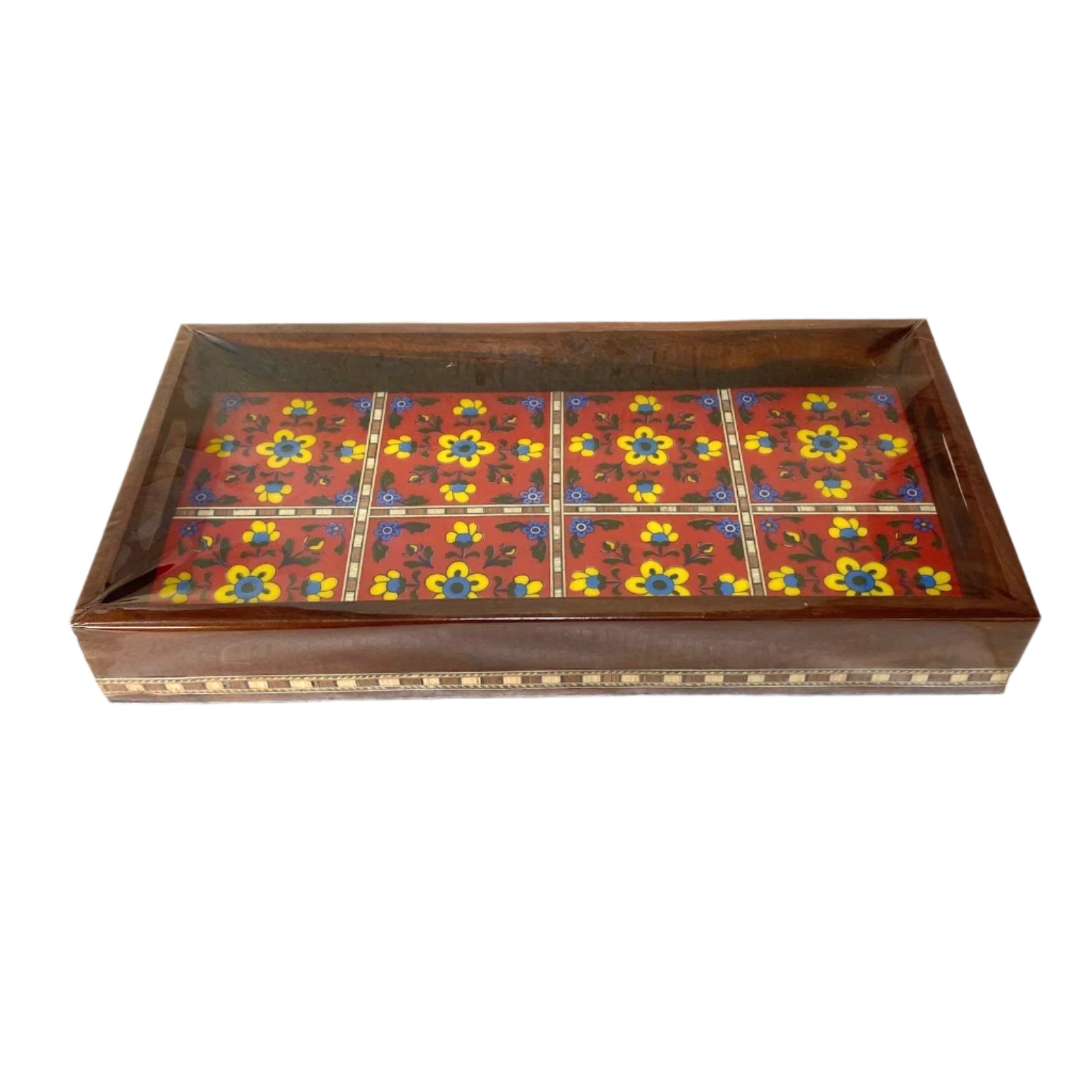 Decorative wooden box with floral patterns on a white background