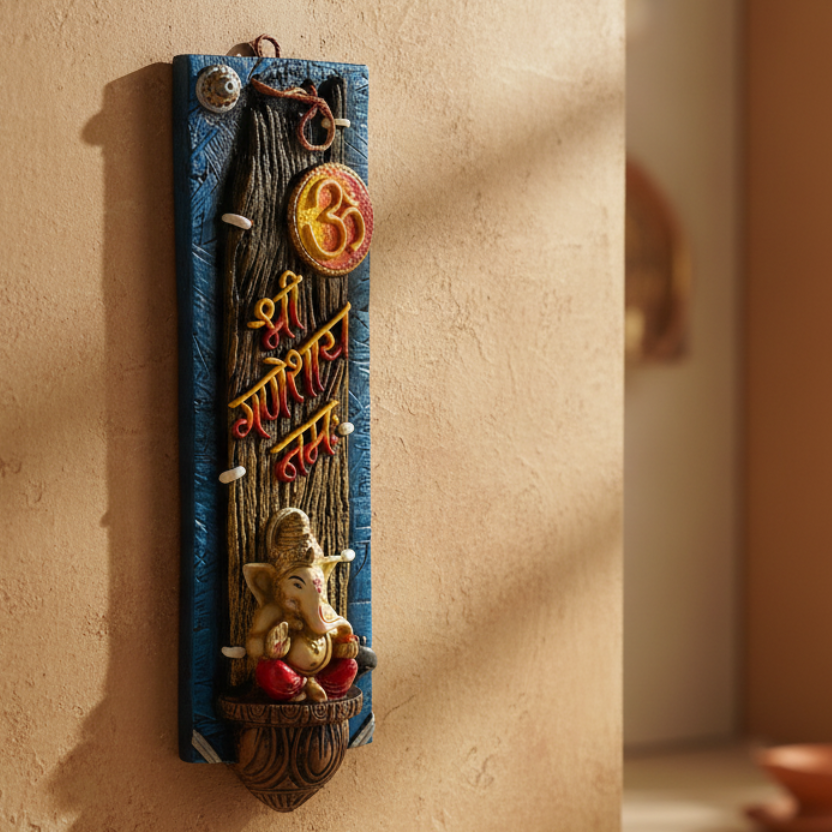 Decorative wall hanging with a statue and text on a blue background