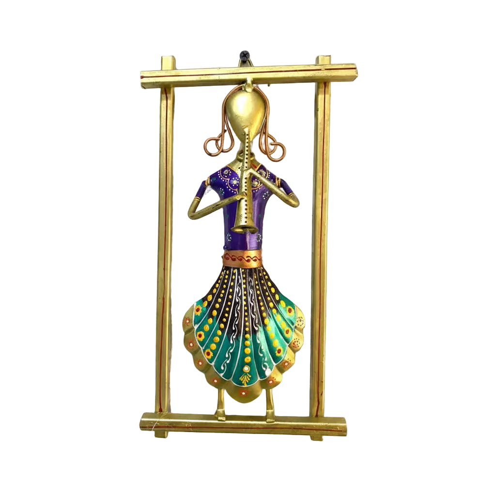 A metal art sculpture of a standing lady in a colorful and traditional attire, primarily green and purple, with gold accents.
