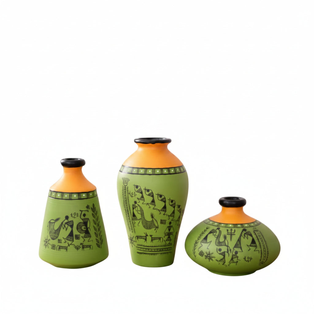Set of three green vases with black patterns on a white background