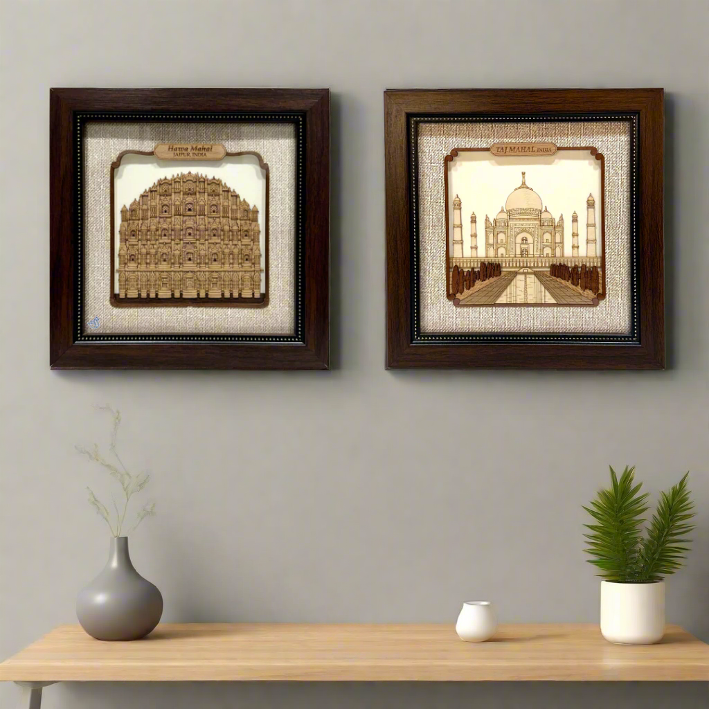 Two framed artworks of architectural landmarks on a white background