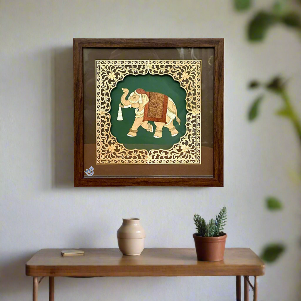 Decorative wall art with an elephant design in a wooden frame on a white background