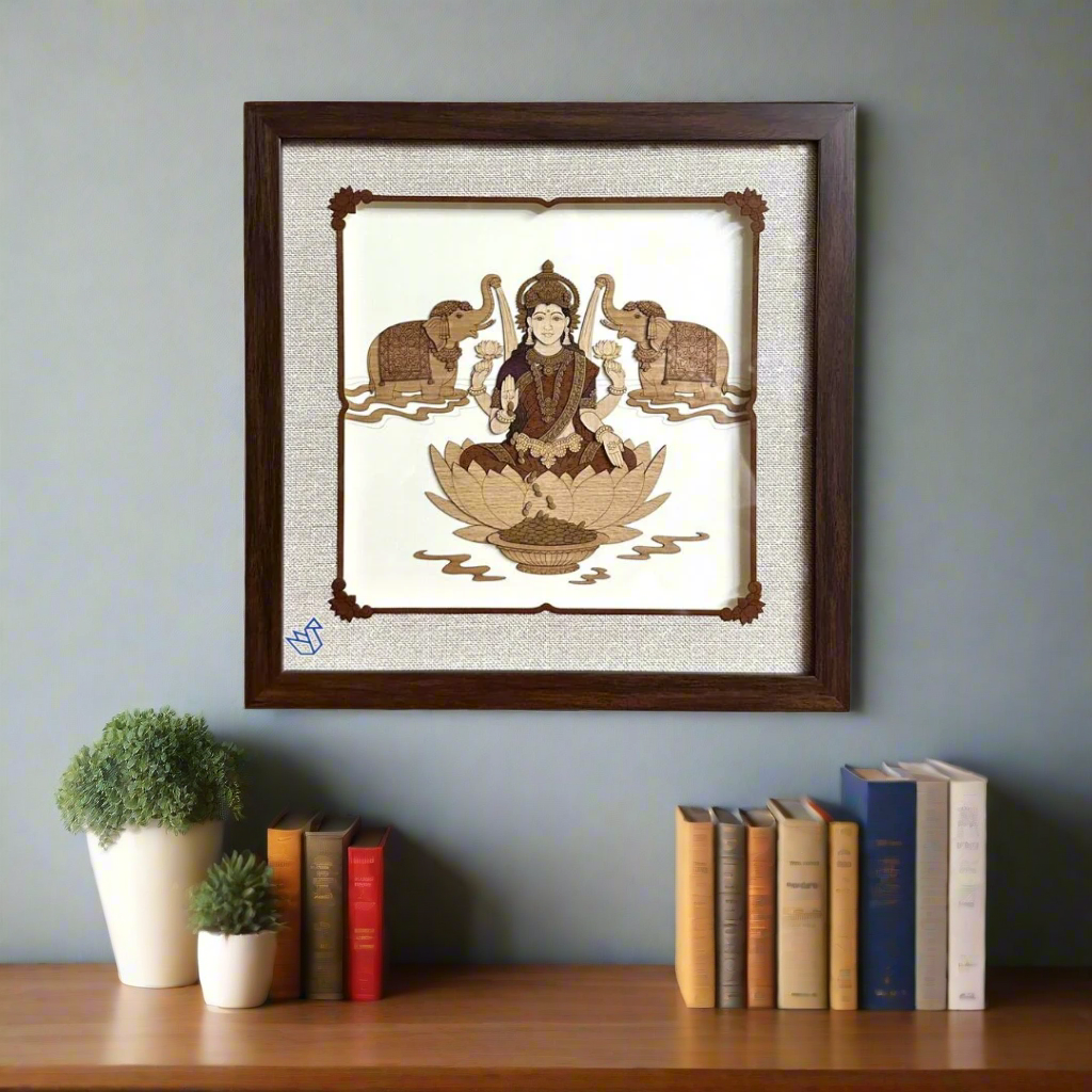 Framed artwork of a deity on a lotus with two elephants, on a white background