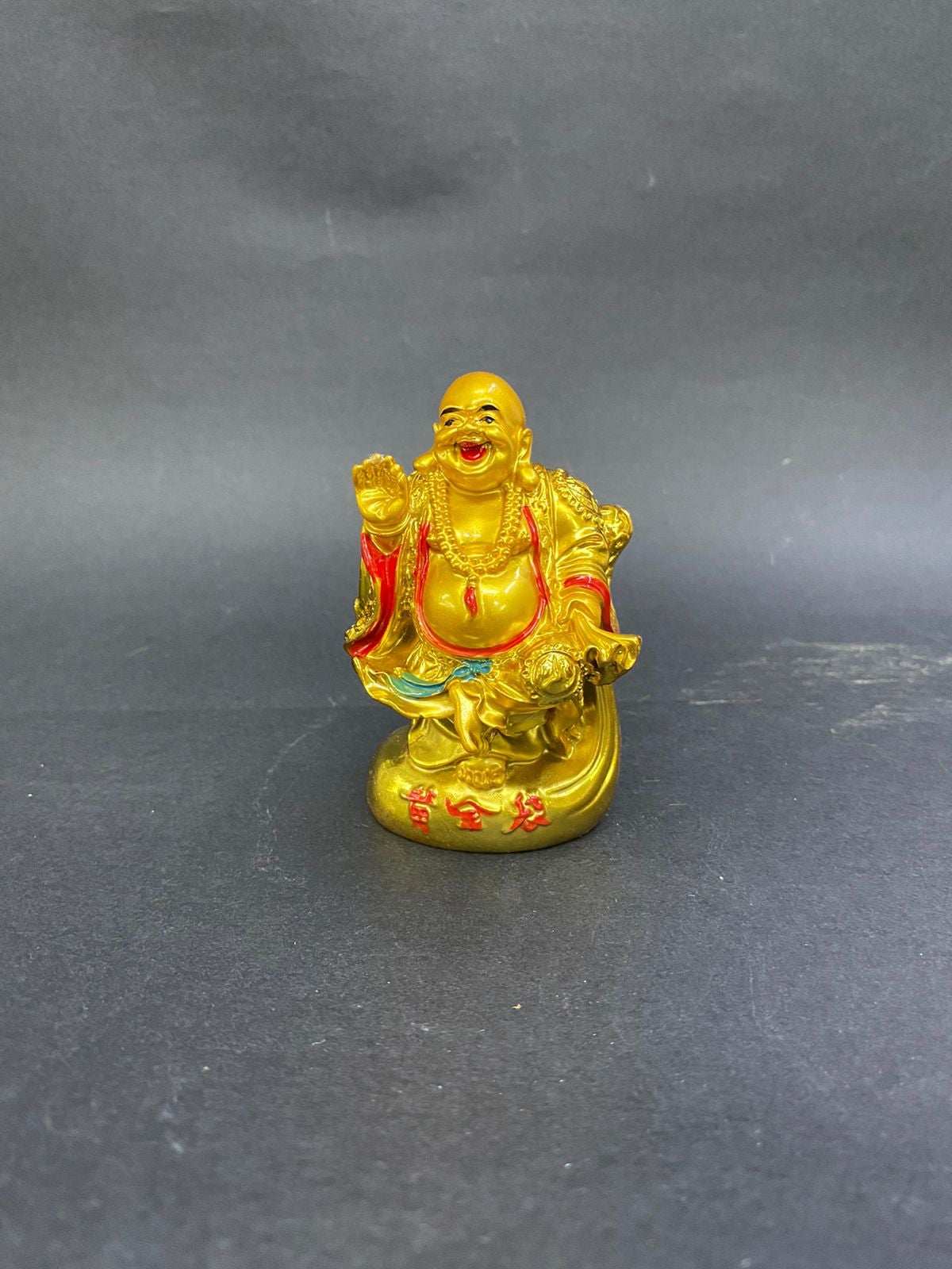 Laughing Buddha Golden Shades In Various Designs Gifting's Form Tamrapatra