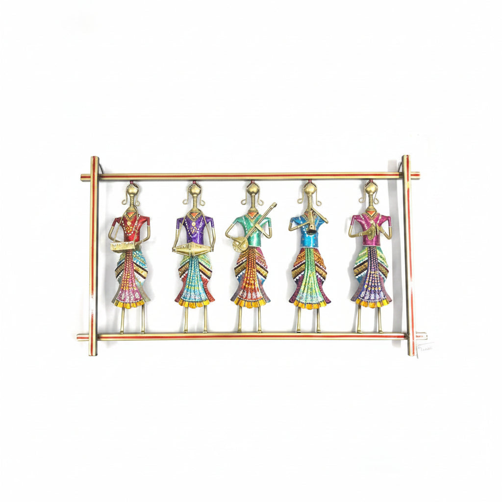 A sculpture of five standing lady musicians in colorful attire, made with metal craftsmanship.